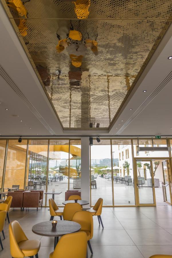 mk hotel tirana Rinas Buitenkant foto The ceiling of the lobby
